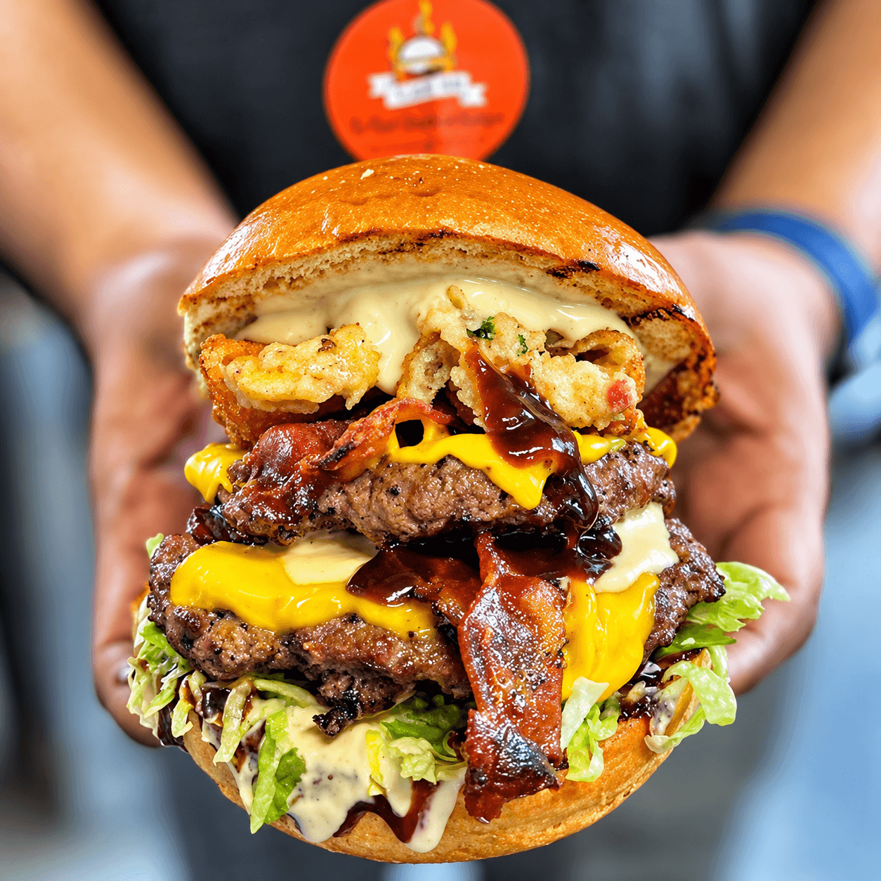 Burger cooking over an open flame
